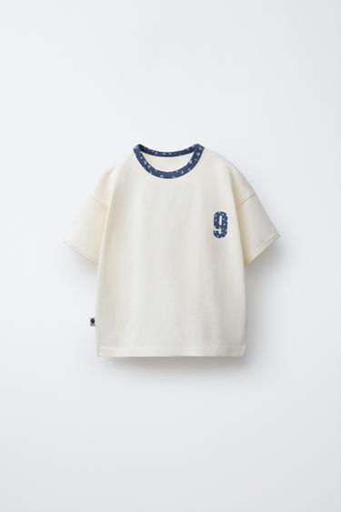 T-SHIRT WITH SLOGAN AND FLORAL PRINT - Light blue by Zara