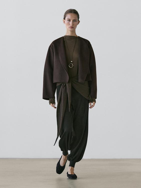 Short coat with rounded lapels