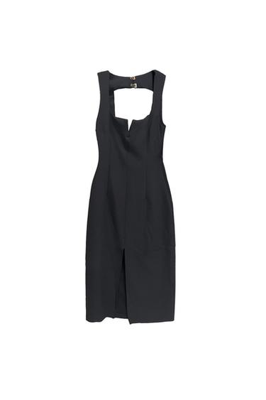 Front view of a black dress with a geometric neckline and front slit.