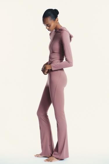 PANTALONI FLARE SEAMLESS IN POLIAMMIDE - Malva di Zara