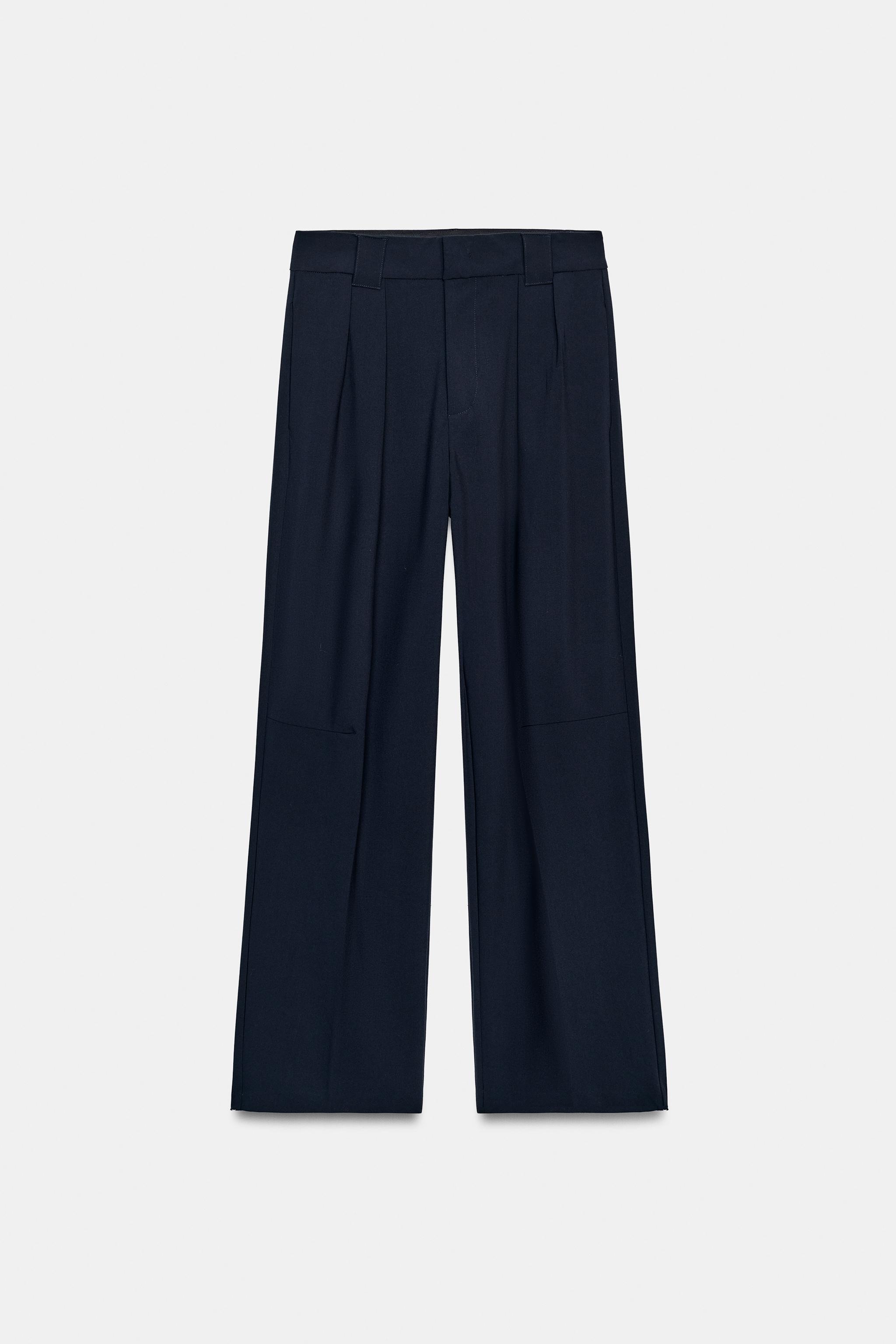 VOLUMETRIC PLEATED PANTS