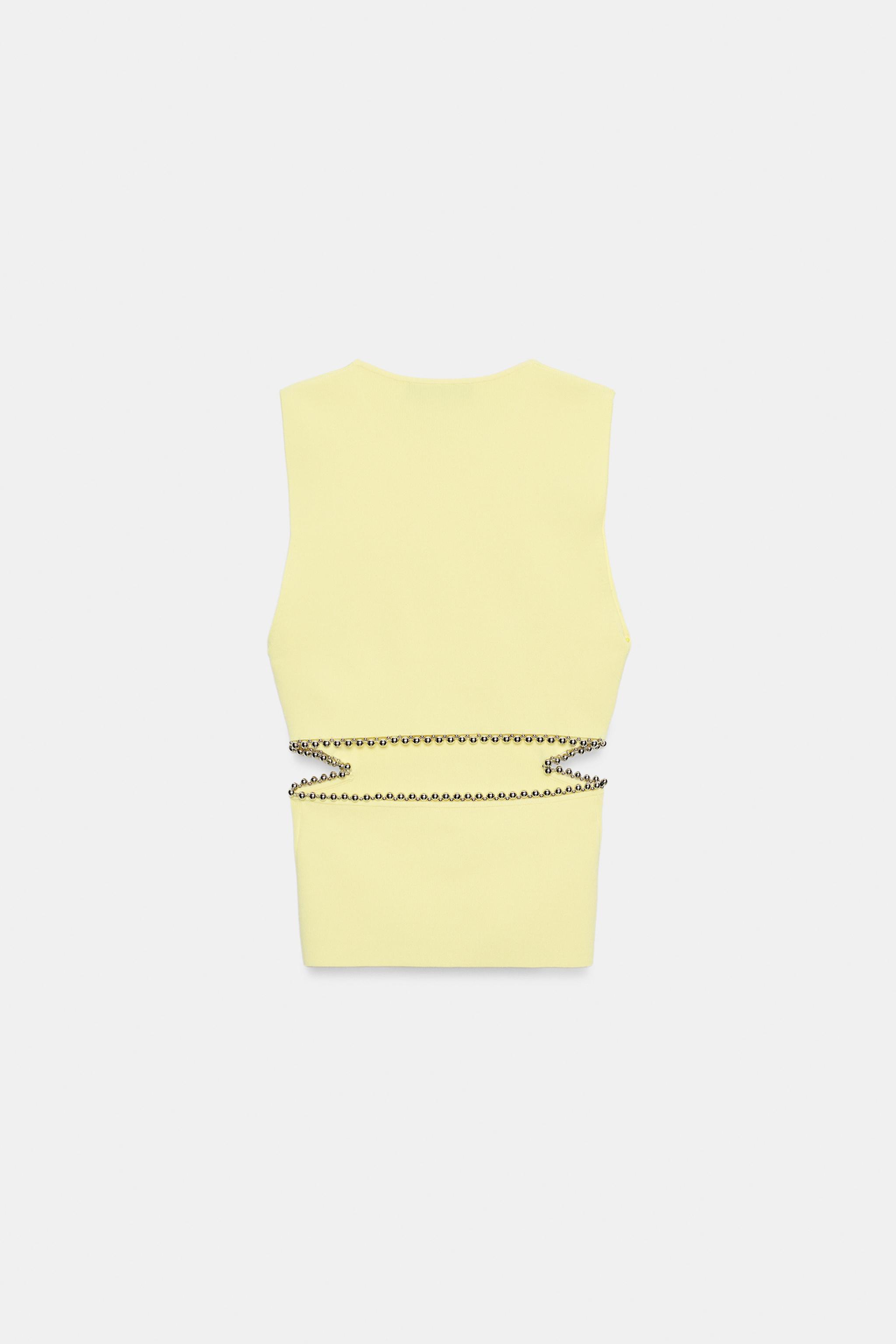 TOP EN MAILLE AJOURÉ AVEC PERLES
