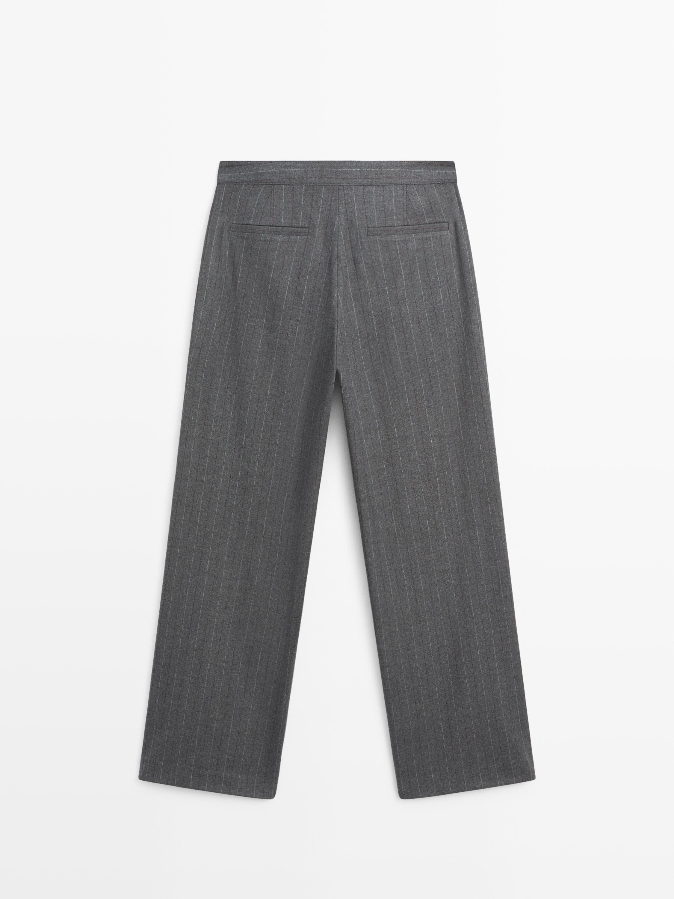 Pantalon à pinces et rayures tennis