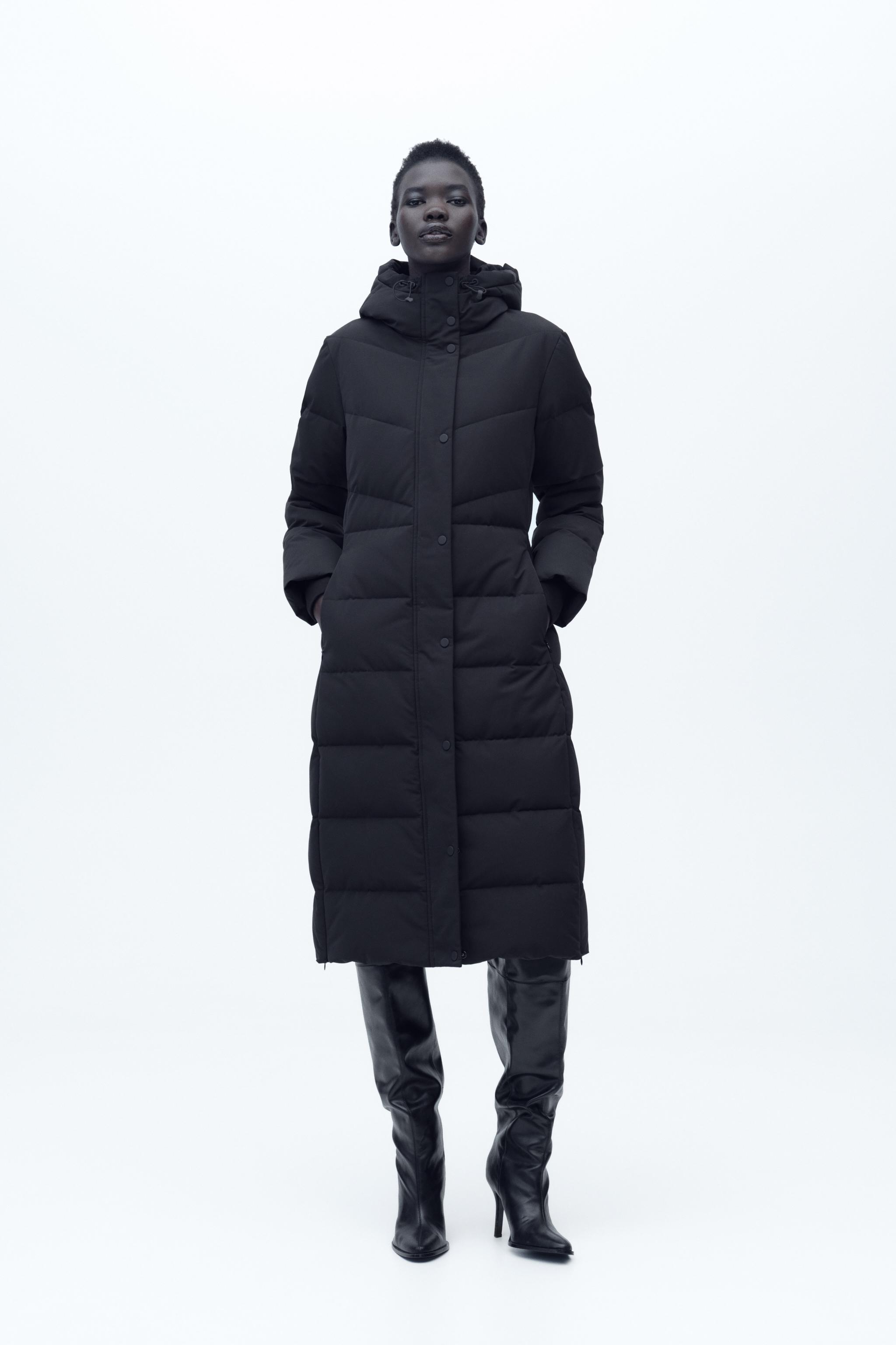 Fitted black puffer jacket on sale