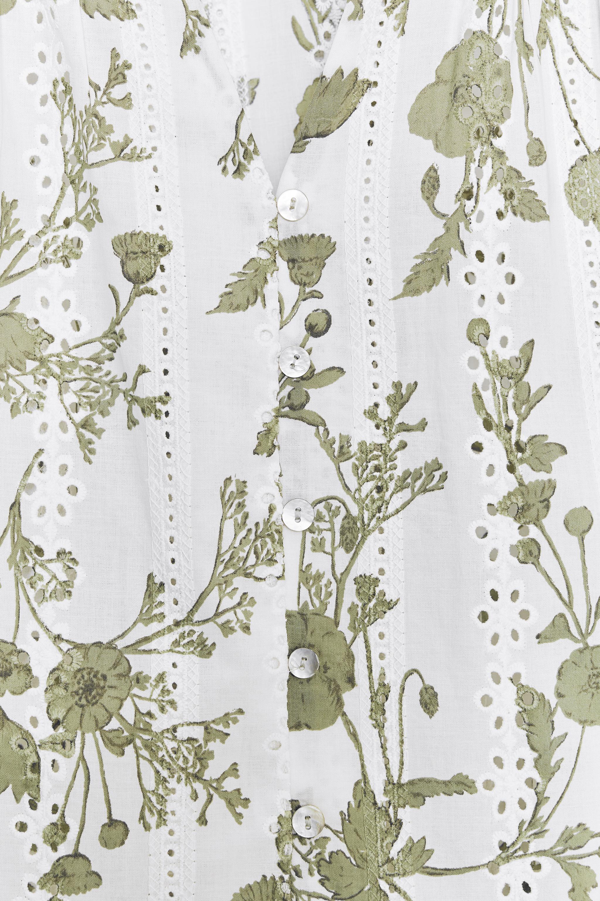 PRINTED TOP WITH EMBROIDERED EYELETS