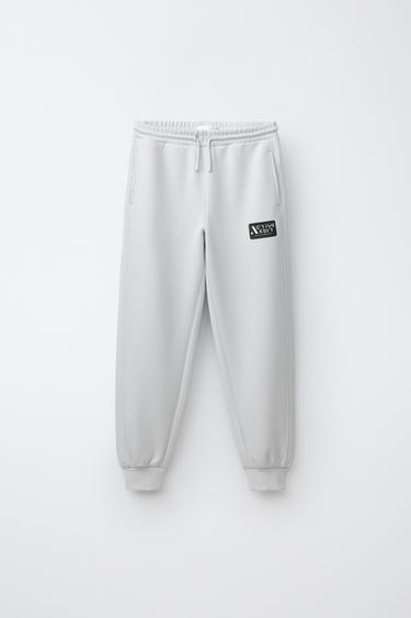 SPORTY TROUSERS WITH LOGO PRINT - Pearl marl by Zara