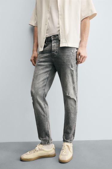 JEANS SKINNY FIT ROTOS - Gris de Zara