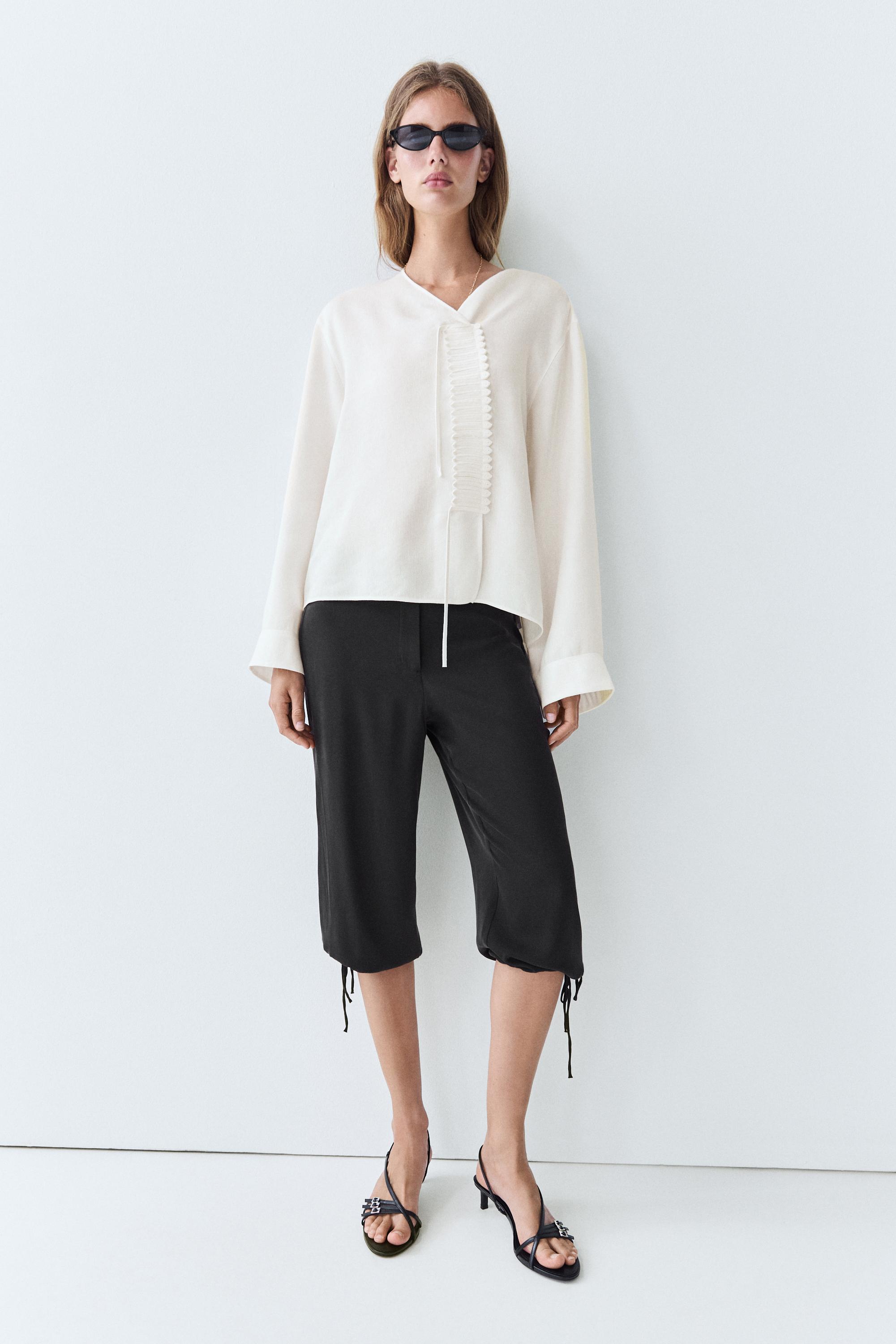 Flowing linen blend blouse with button detail