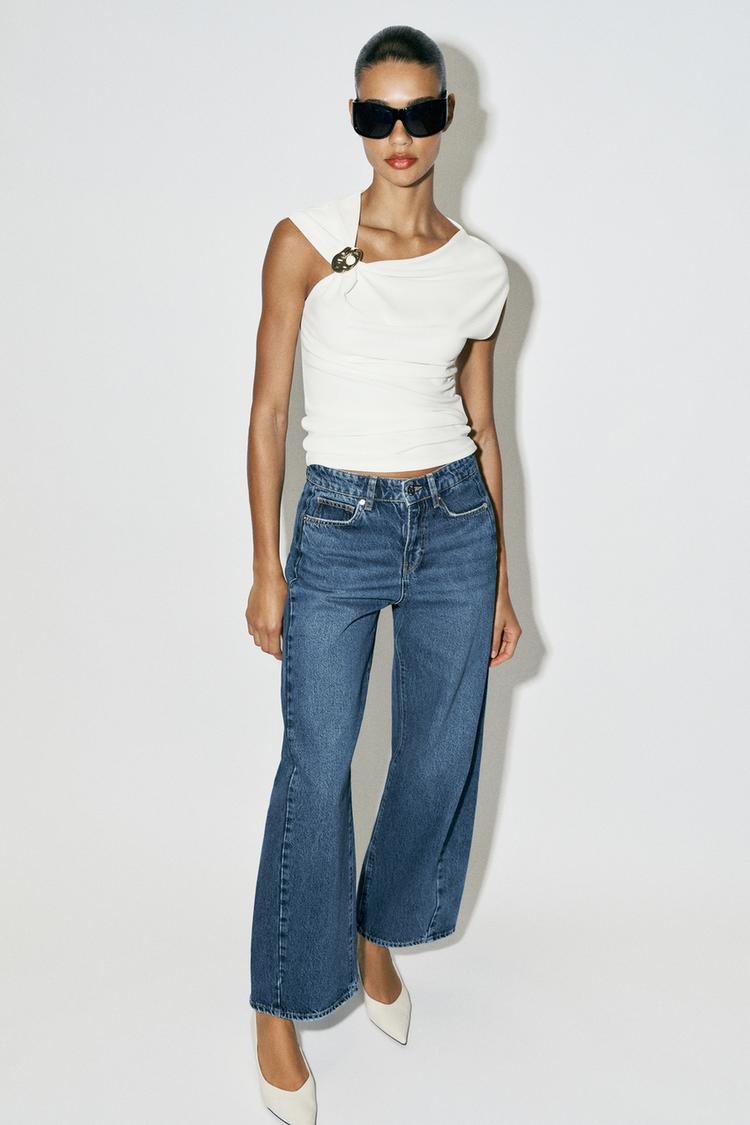 DRAPED TOP WITH EMBELLISHMENT