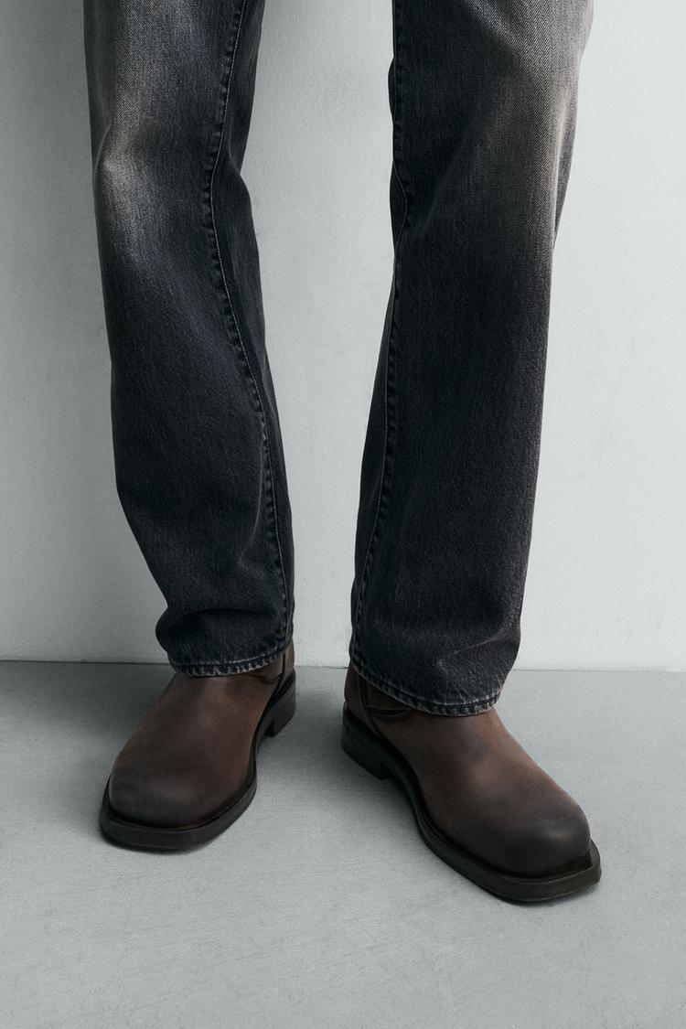 LIMITED EDITION BUCKLED LEATHER BOOTS
