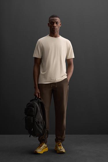 ШТАНИ З ТЕХНОЛОГІЧНОЇ ТКАНИНИ - Коричневий Zara - Зображення 0