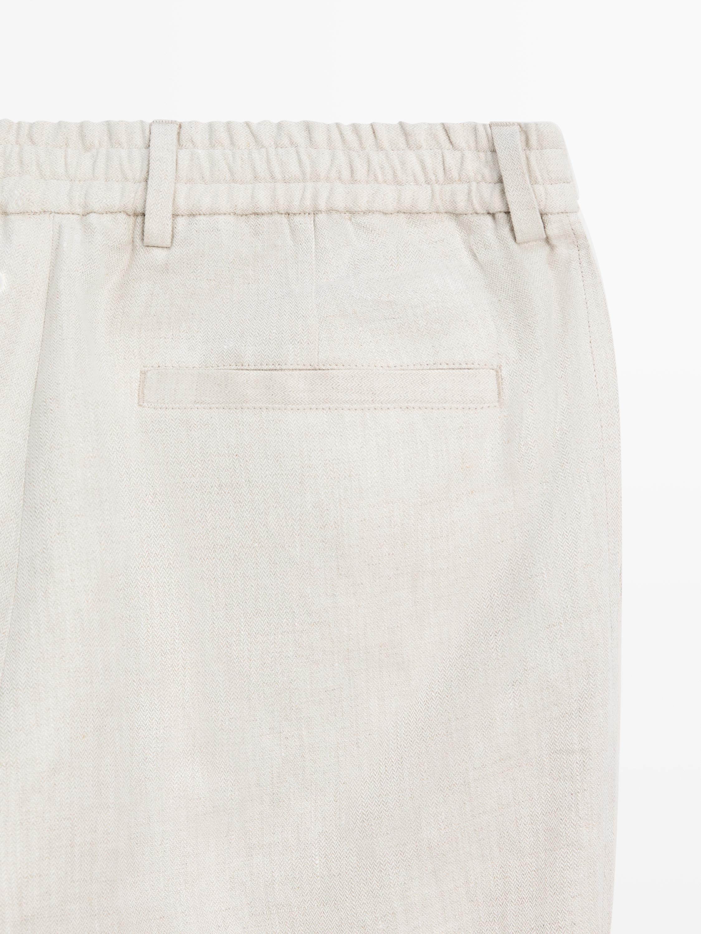Lightweight linen trousers with herringbone detail