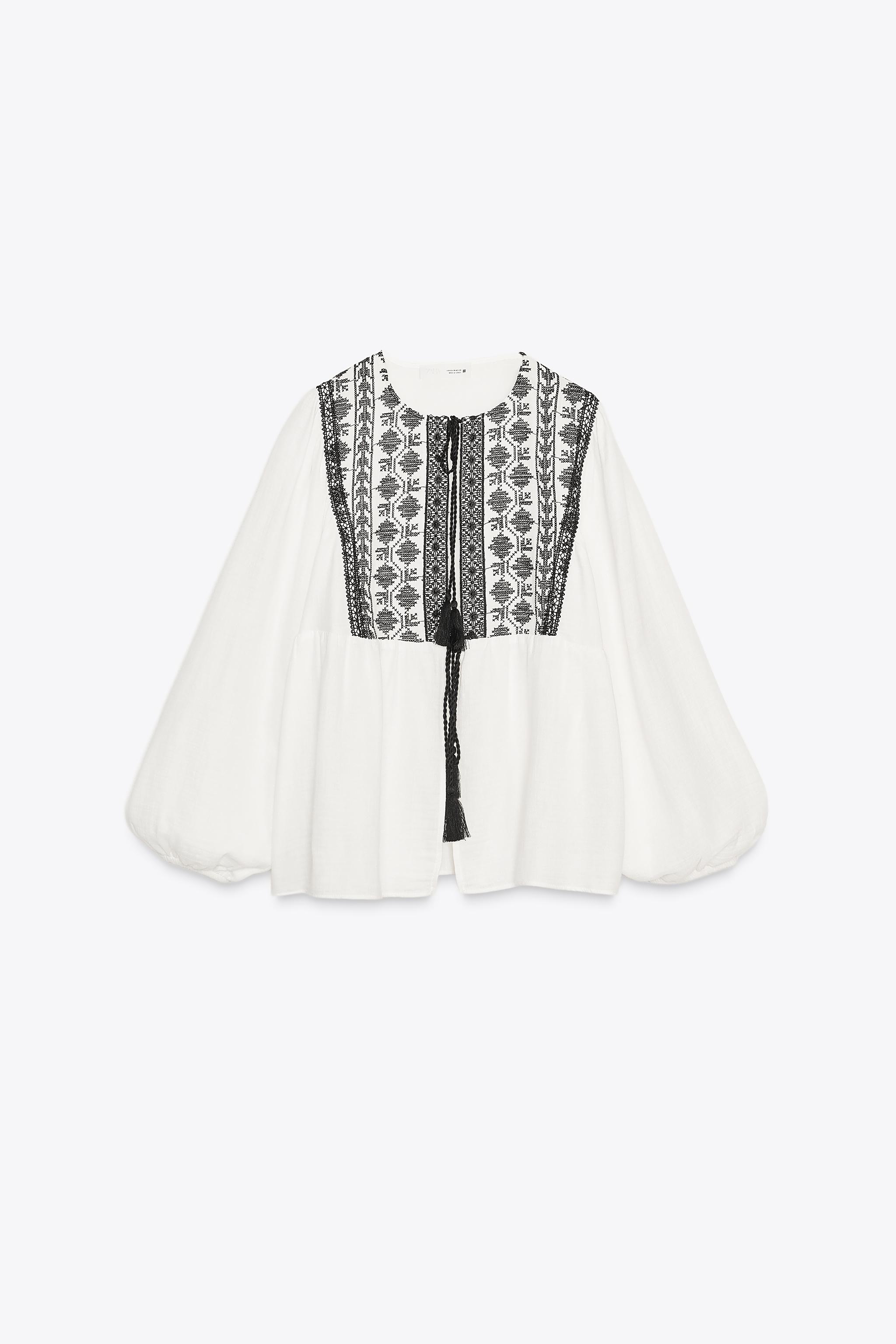 VESTE BRODERIES CONTRASTANTES