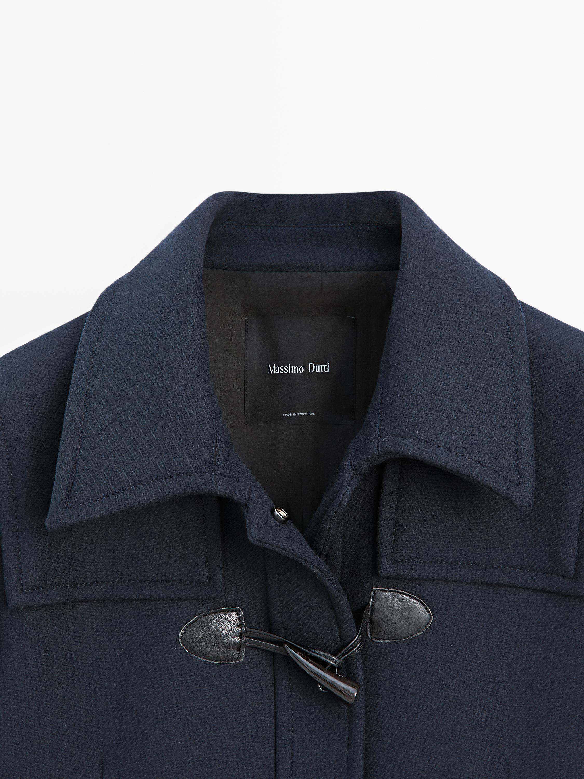 Long coat with toggles