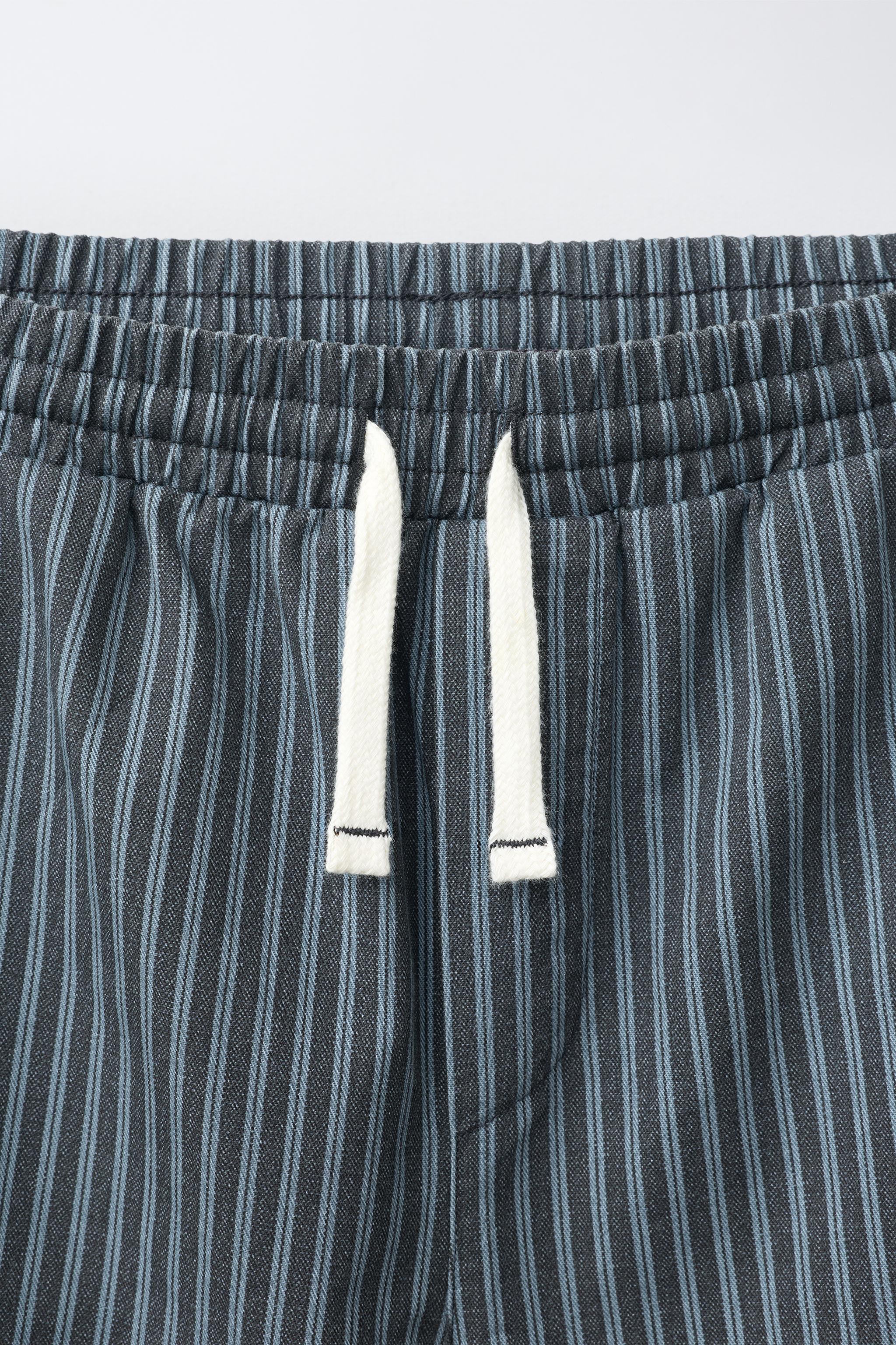 STRIPED BAGGY PANTS