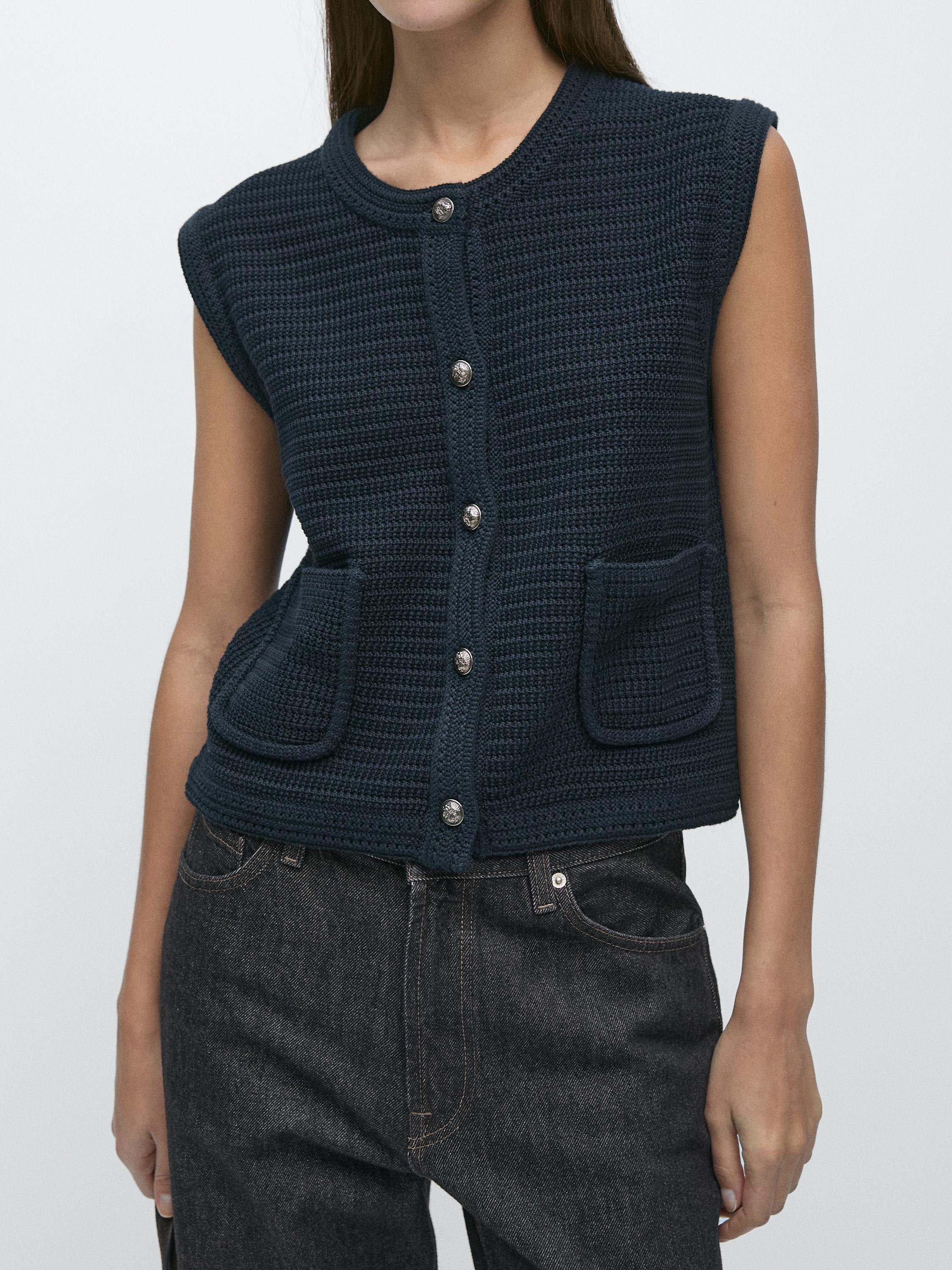 Knit vest with golden buttons