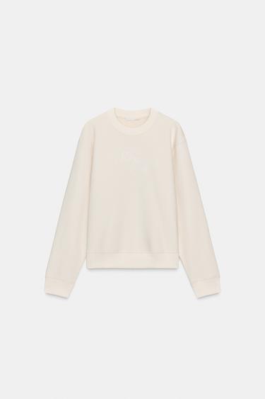 Zara DUKSERICA SA TEKSTOM SA PREDNJE STRANE – Ekru