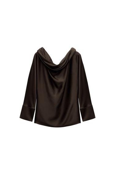 Back view of brown blouse with cowl neck and long sleeves.
