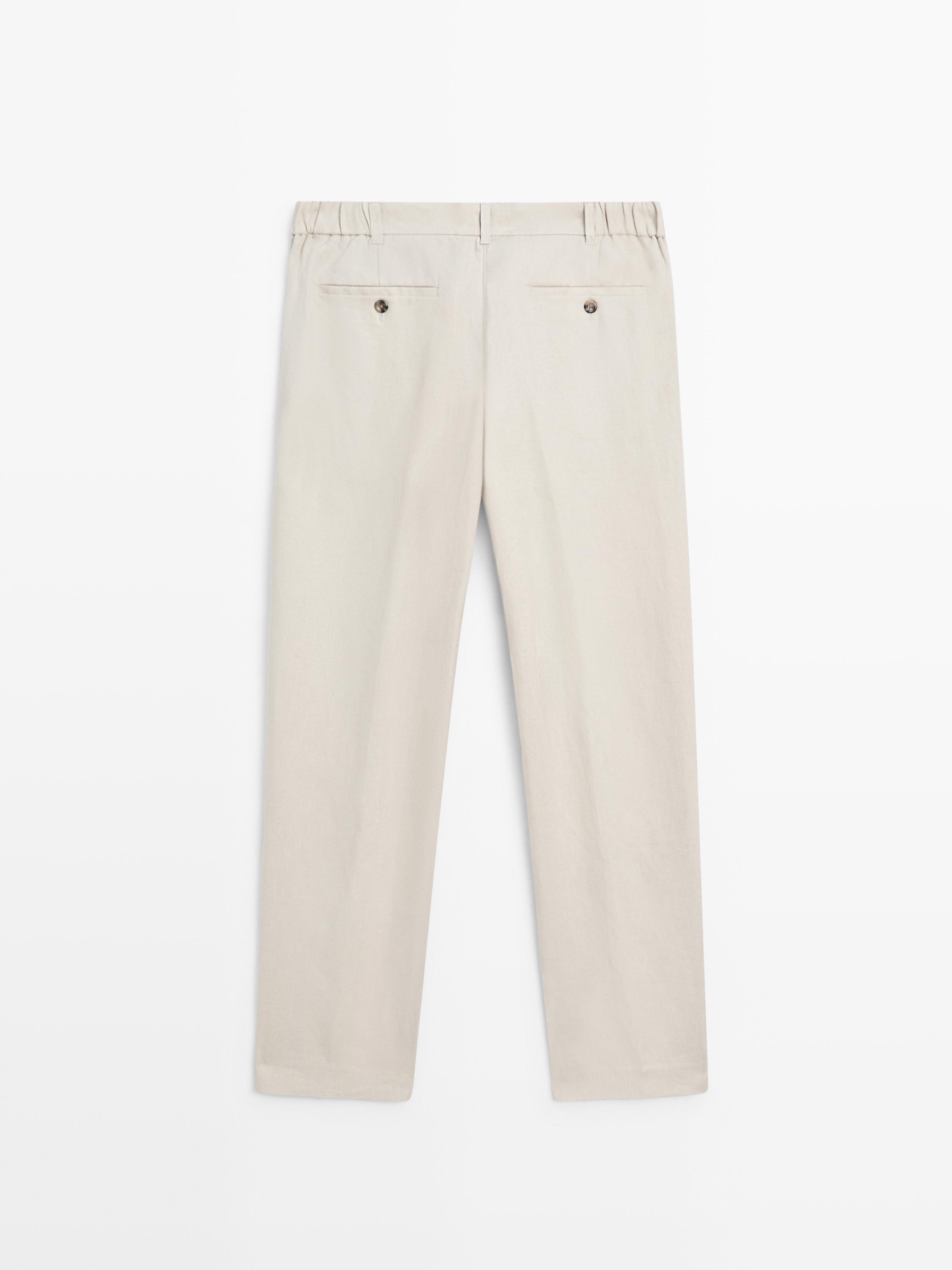 Tapered fit linen trousers