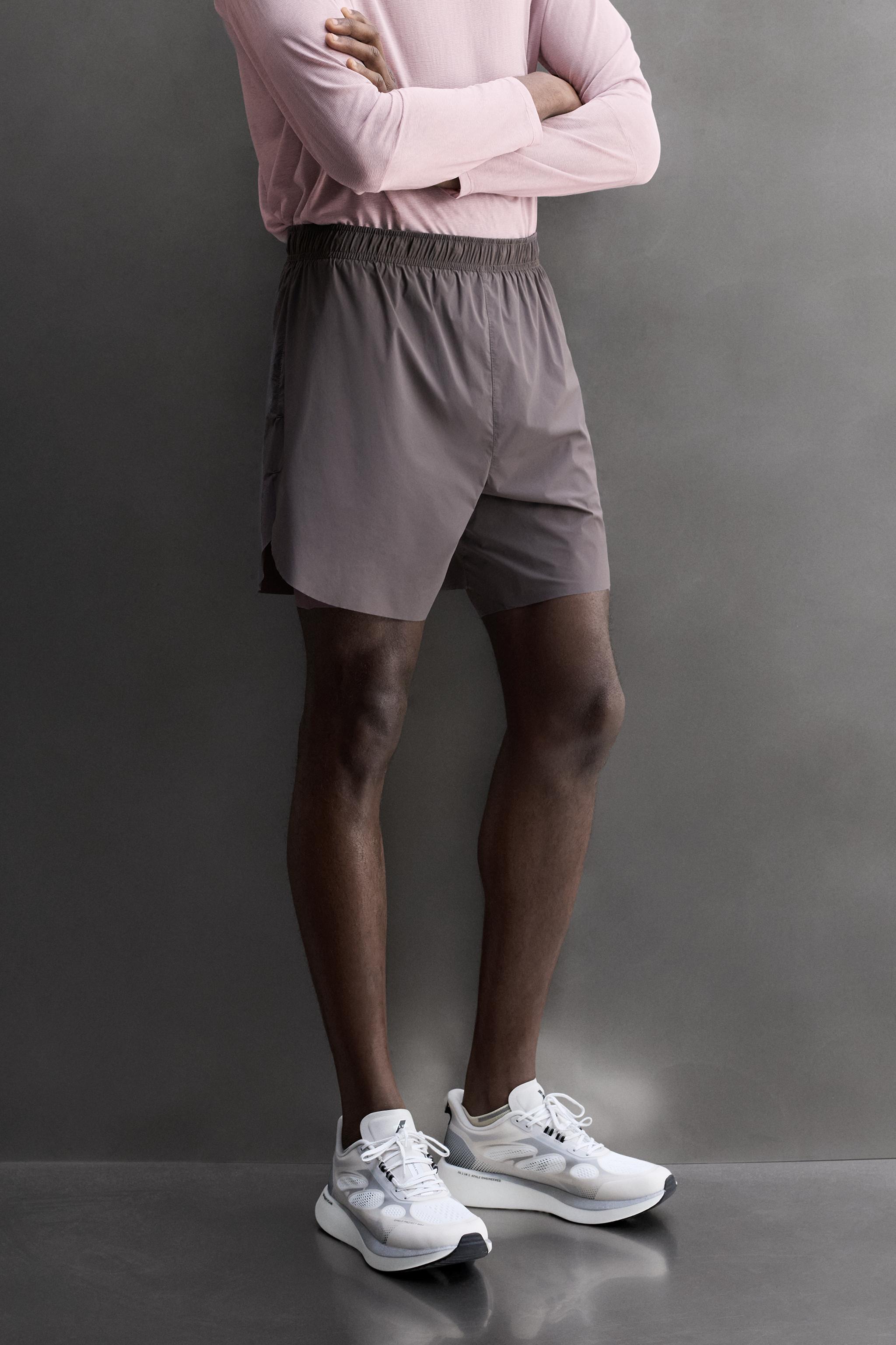 2-IN-1 RUNNING SHORTS — Purple