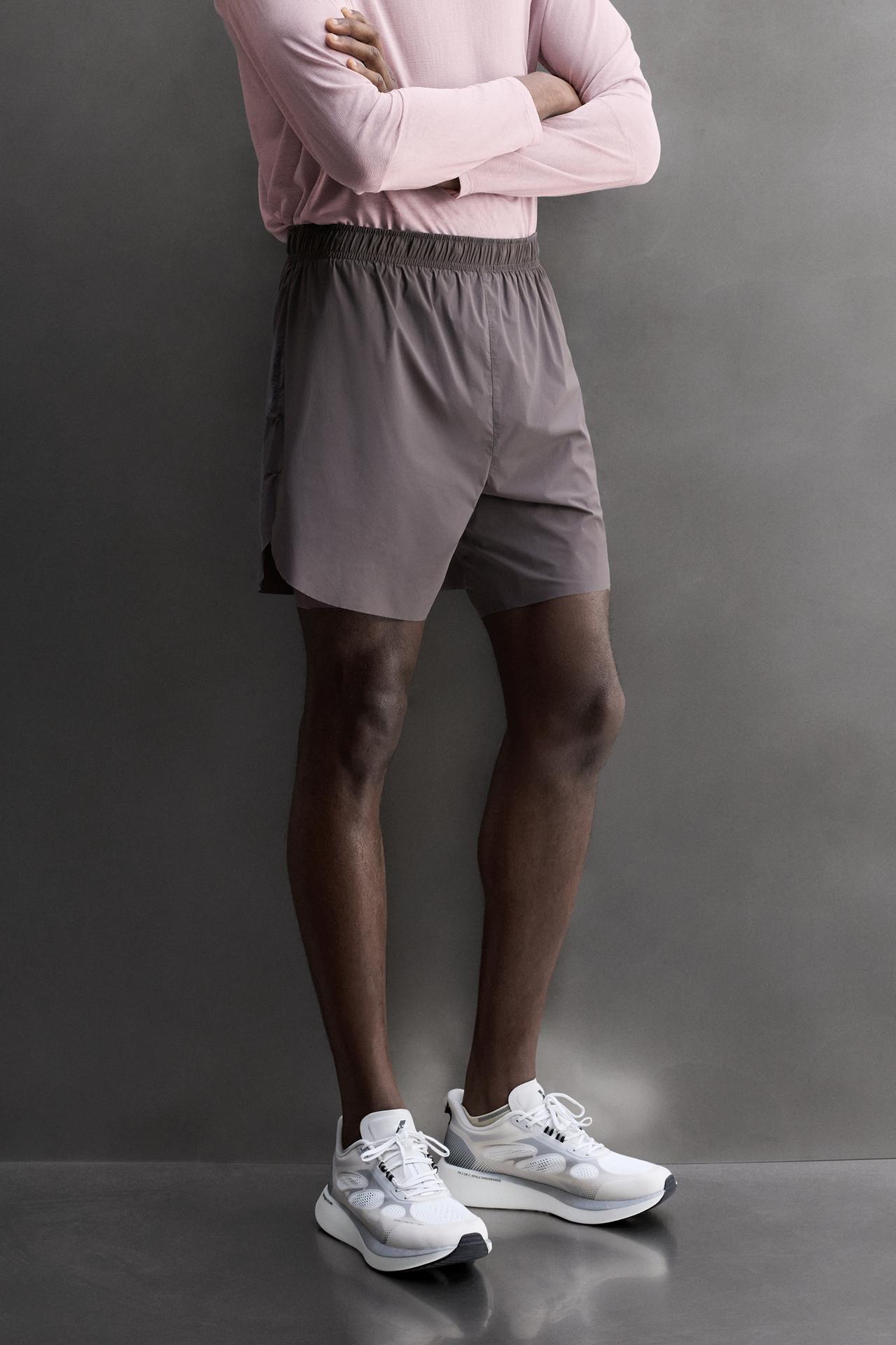 2-IN-1 RUNNING SHORTS — Purple