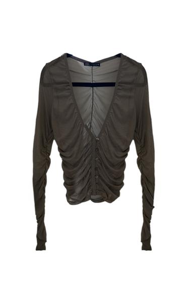 BLUSA CON MANGAS GRIS TRANSPARENTE