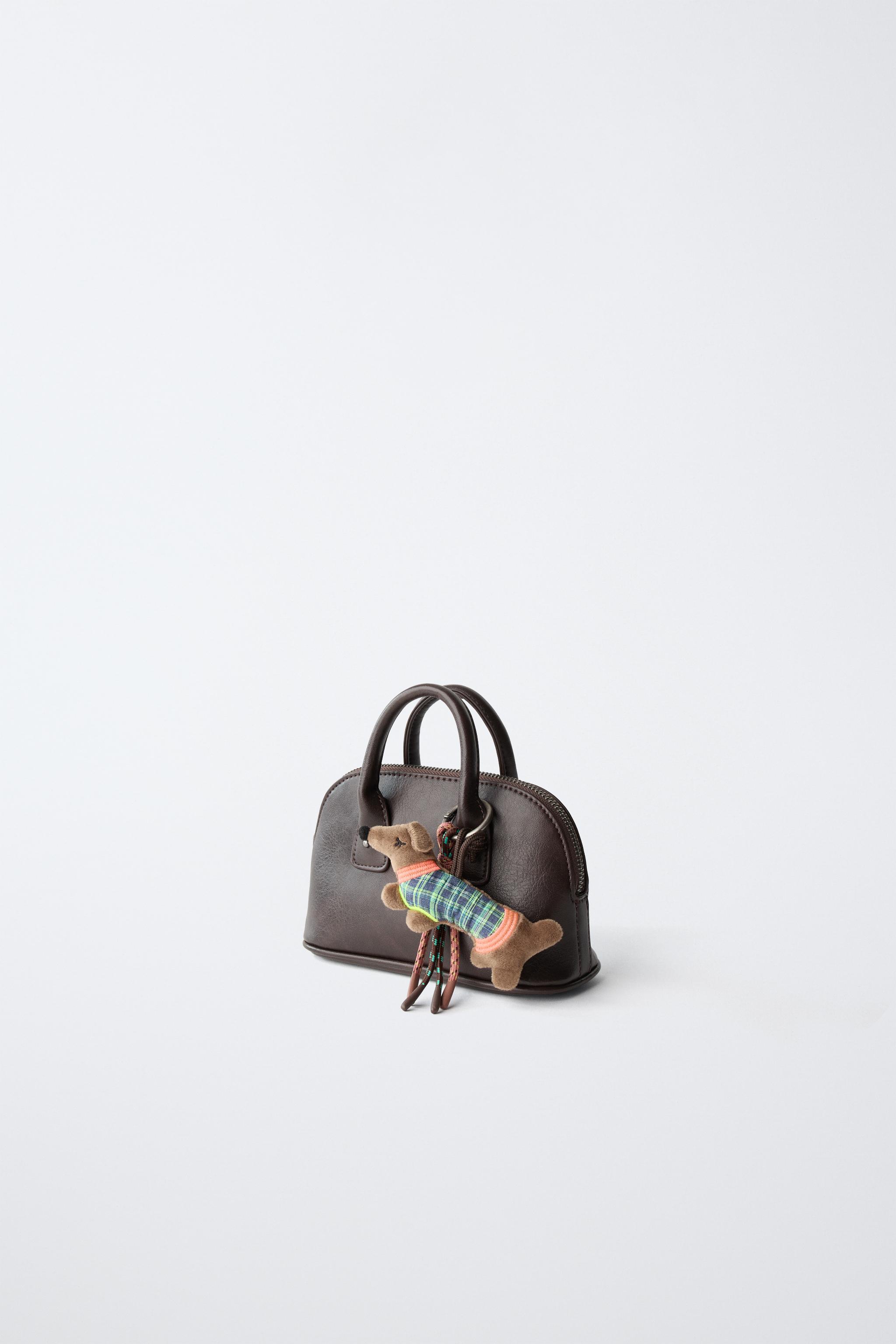 CHARM CROSSBODY BAG — Brown