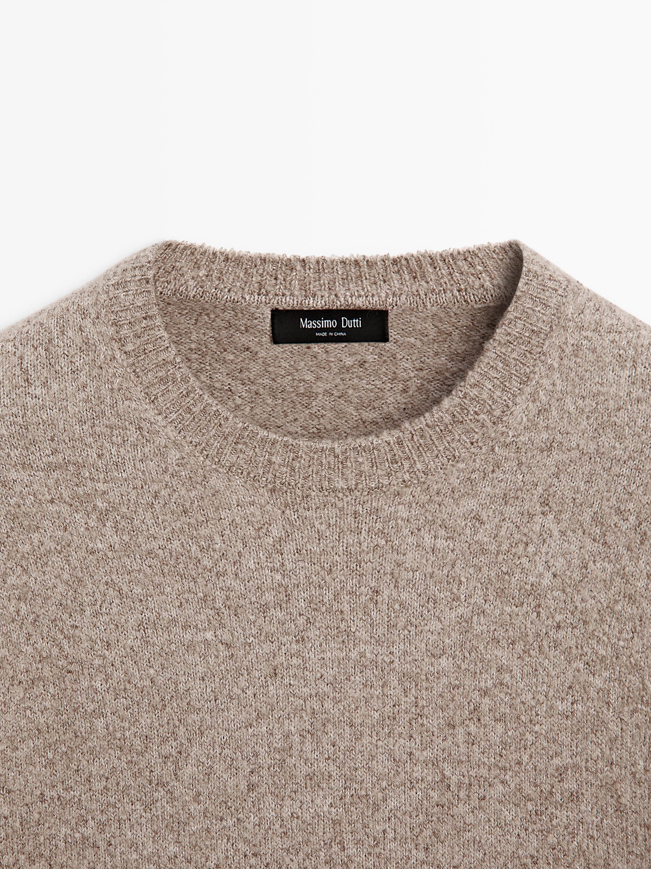 Flecked crew neck knit sweater