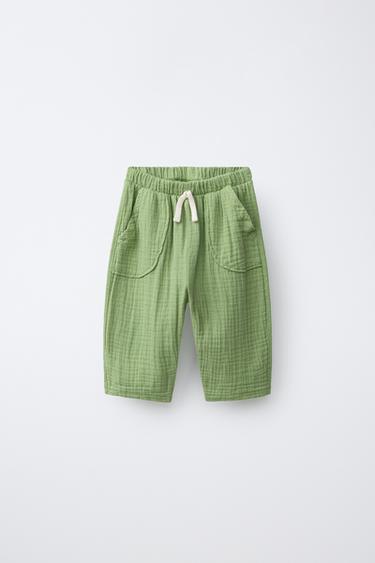 Zara PANTALONE SA KOMBINOVANOM TEKSTUROM – Zelena