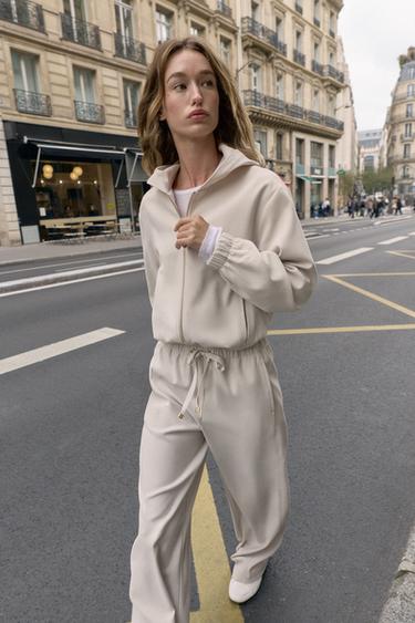 WIDE-LEG TROUSERS WITH ELASTIC WAISTBAND - Ecru by Zara