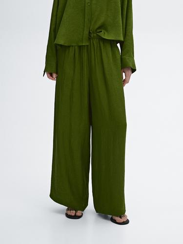 Pantalón fluido cintura elástica satinado - Verde de Zara