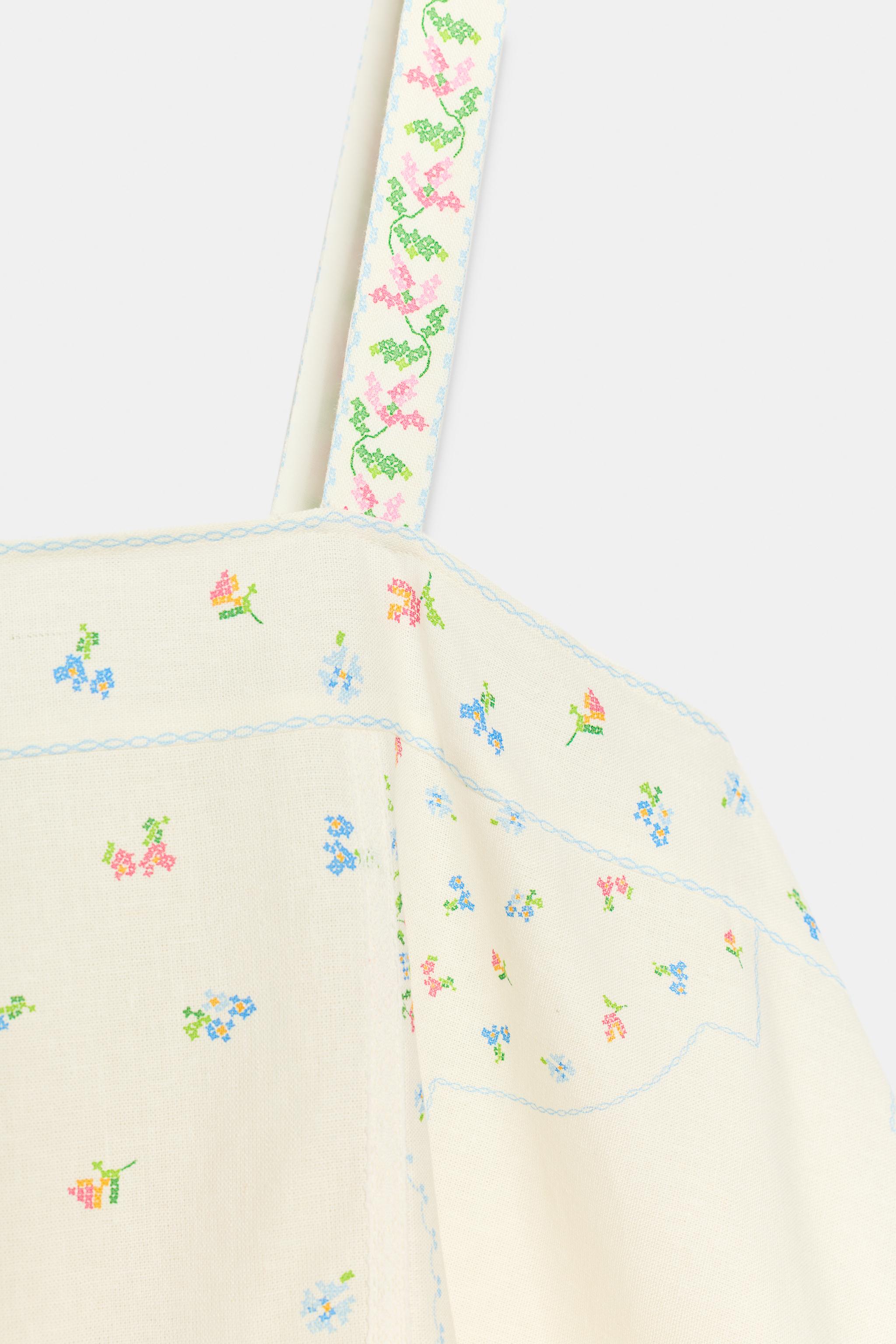TOP ASYMÉTRIQUE IMPRIMÉ FLEURI EN LIN