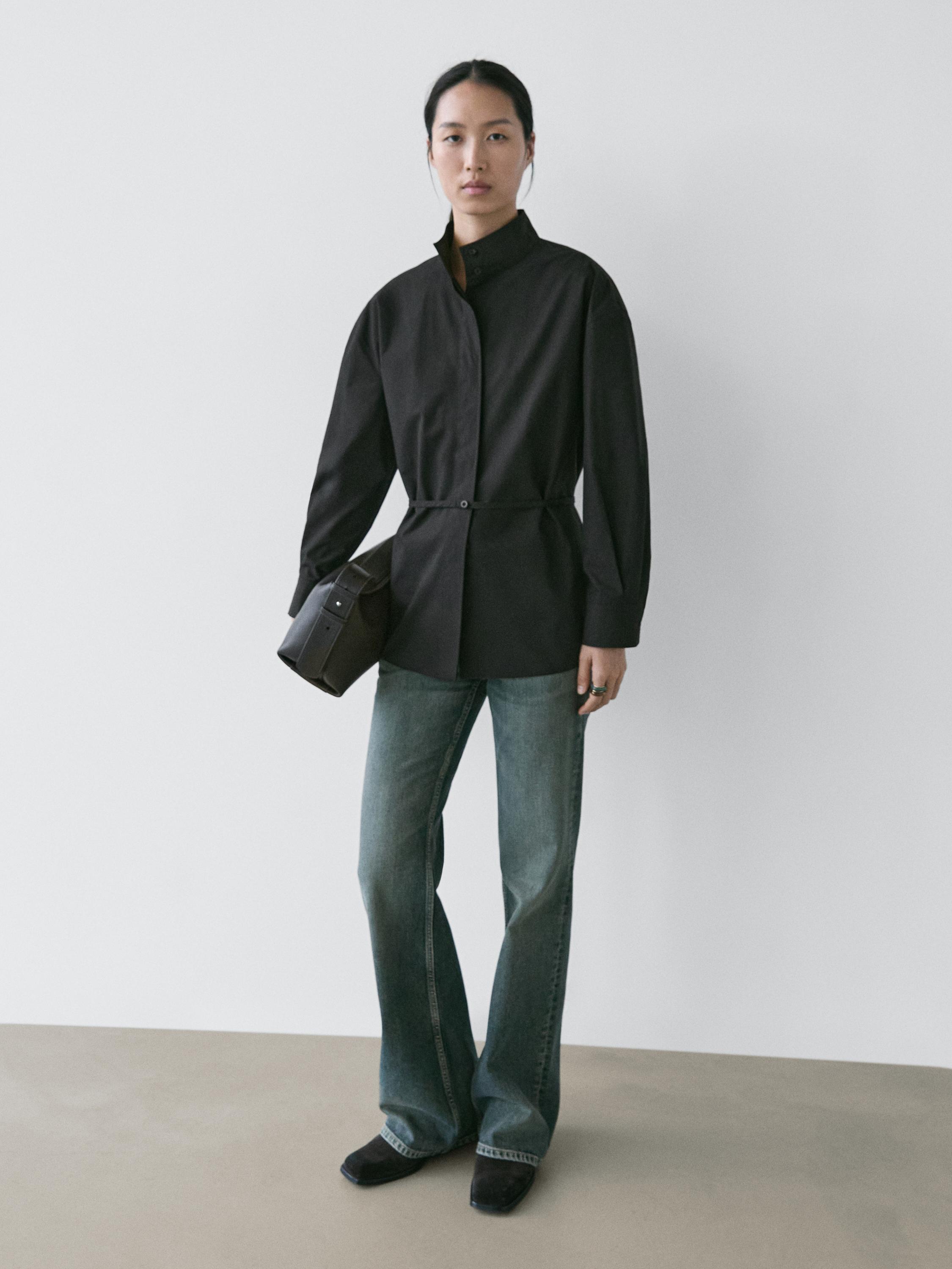 High neck shirt with strap detail