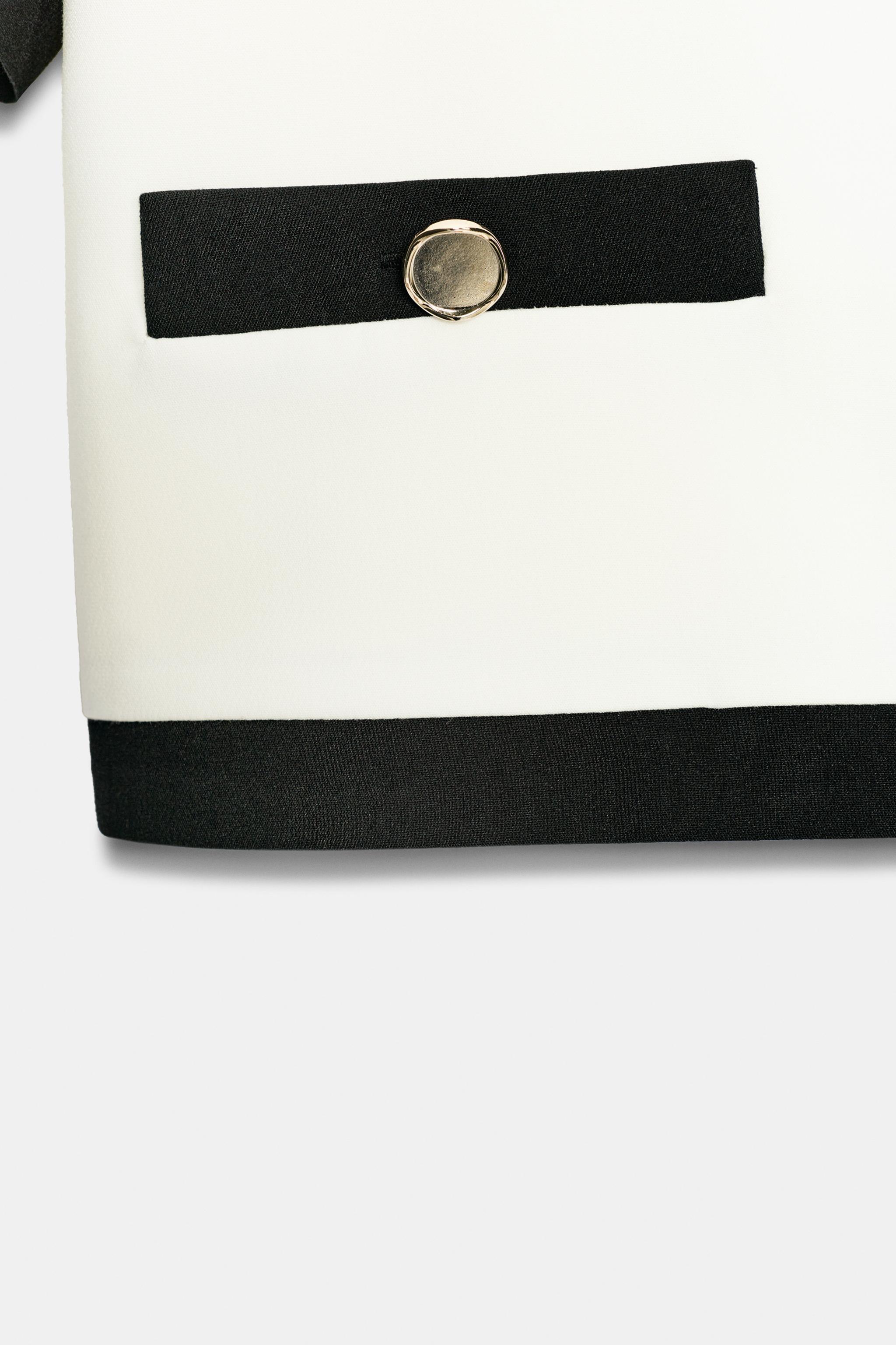 SHORT SLEEVE BLAZER WITH CONTRASTING PIPING