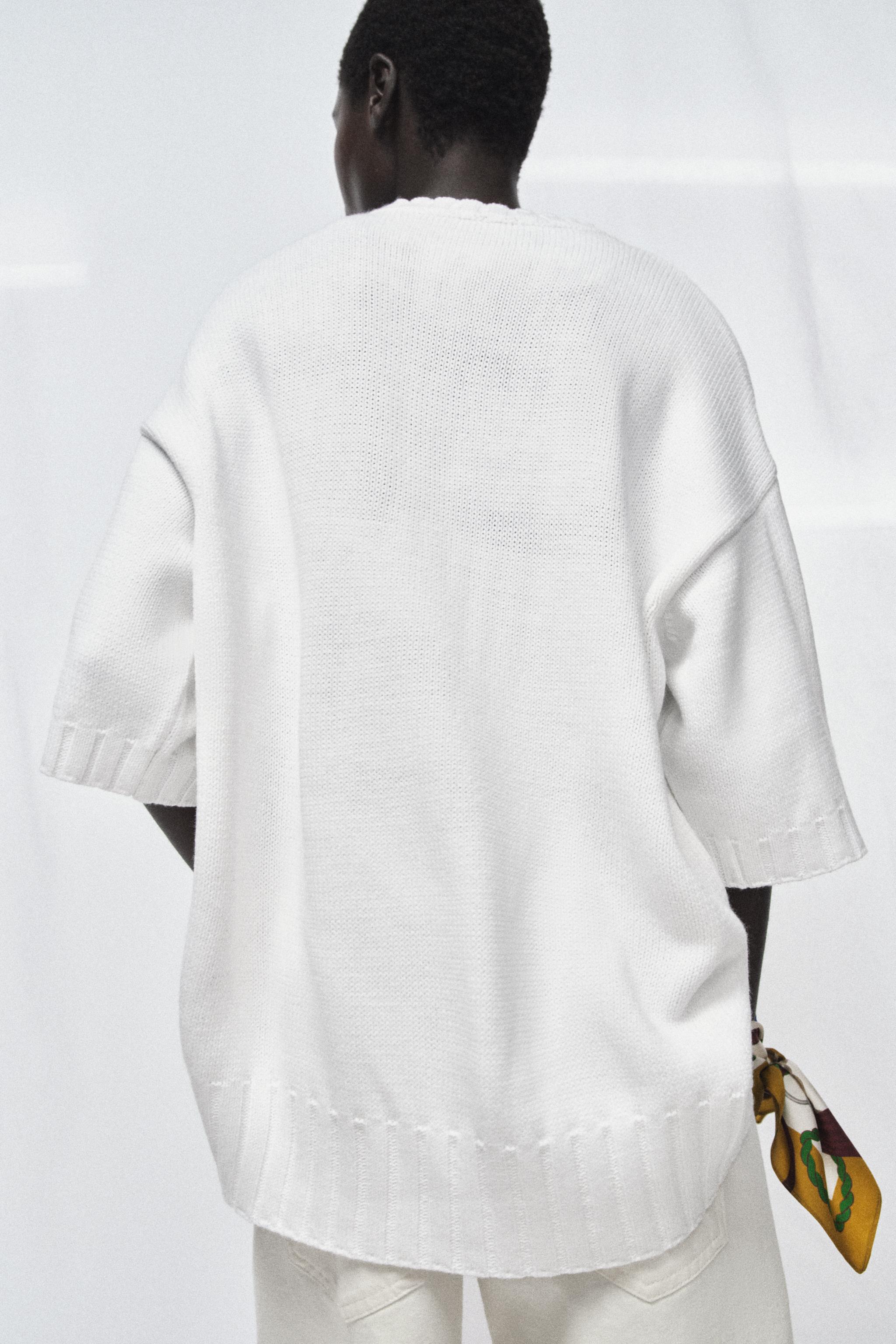 ASYMMETRIC HEM SHORT SLEEVE KNIT JUMPER