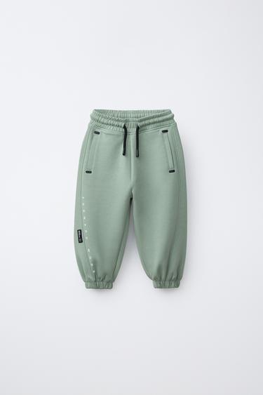 Zara SPORTSKE HLAČE INTERLOCK – svijetlozelena