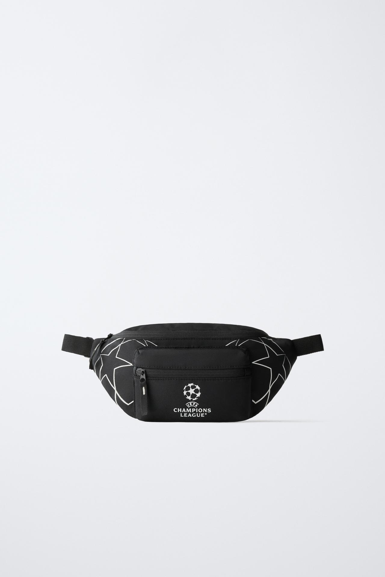 UEFA CHAMPIONS LEAGUE ® GLOW IN THE DARK BELT BAG — Black