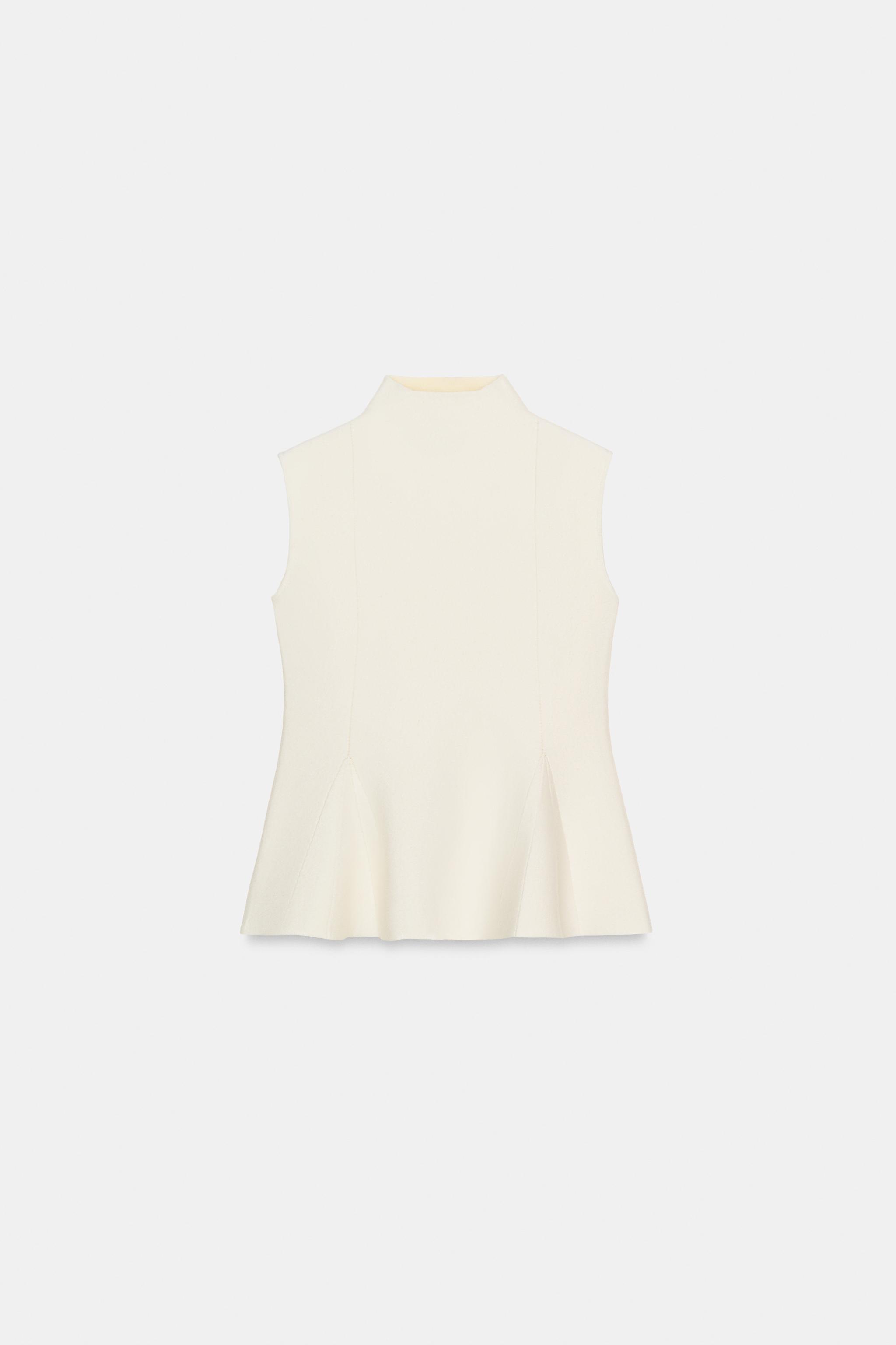 TOP EN MAILLE PÉPLUM