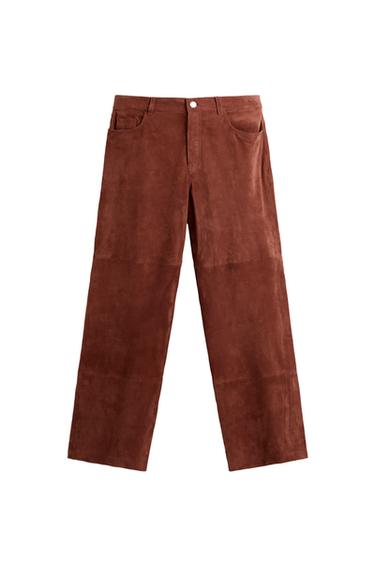 Front view of brown trousers with side pockets.