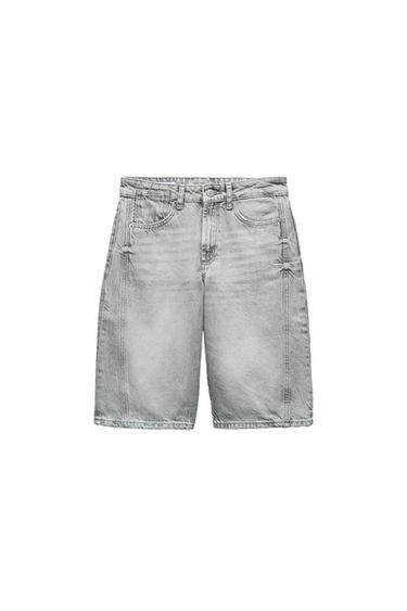 Front view of grey shorts with front pockets and belt loops.