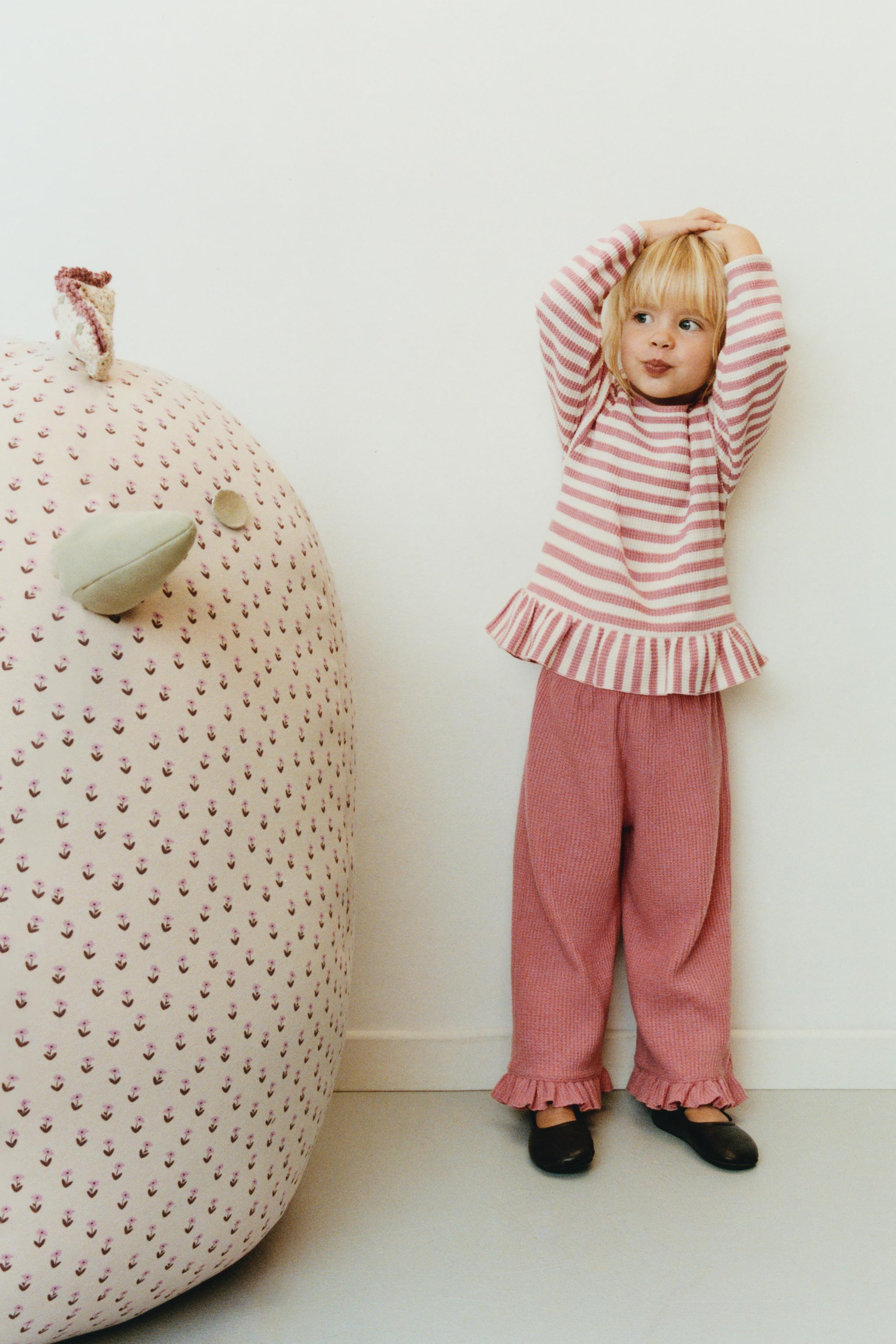 STRIPED WAFFLE KNIT PEPLUM TOP