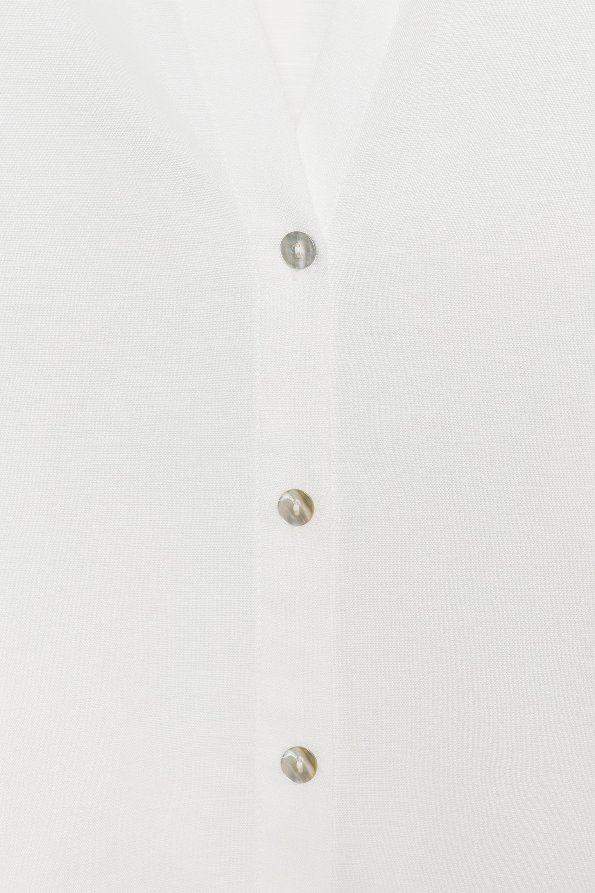 CHEMISE À MANCHES BOUFFANTES EN LIN