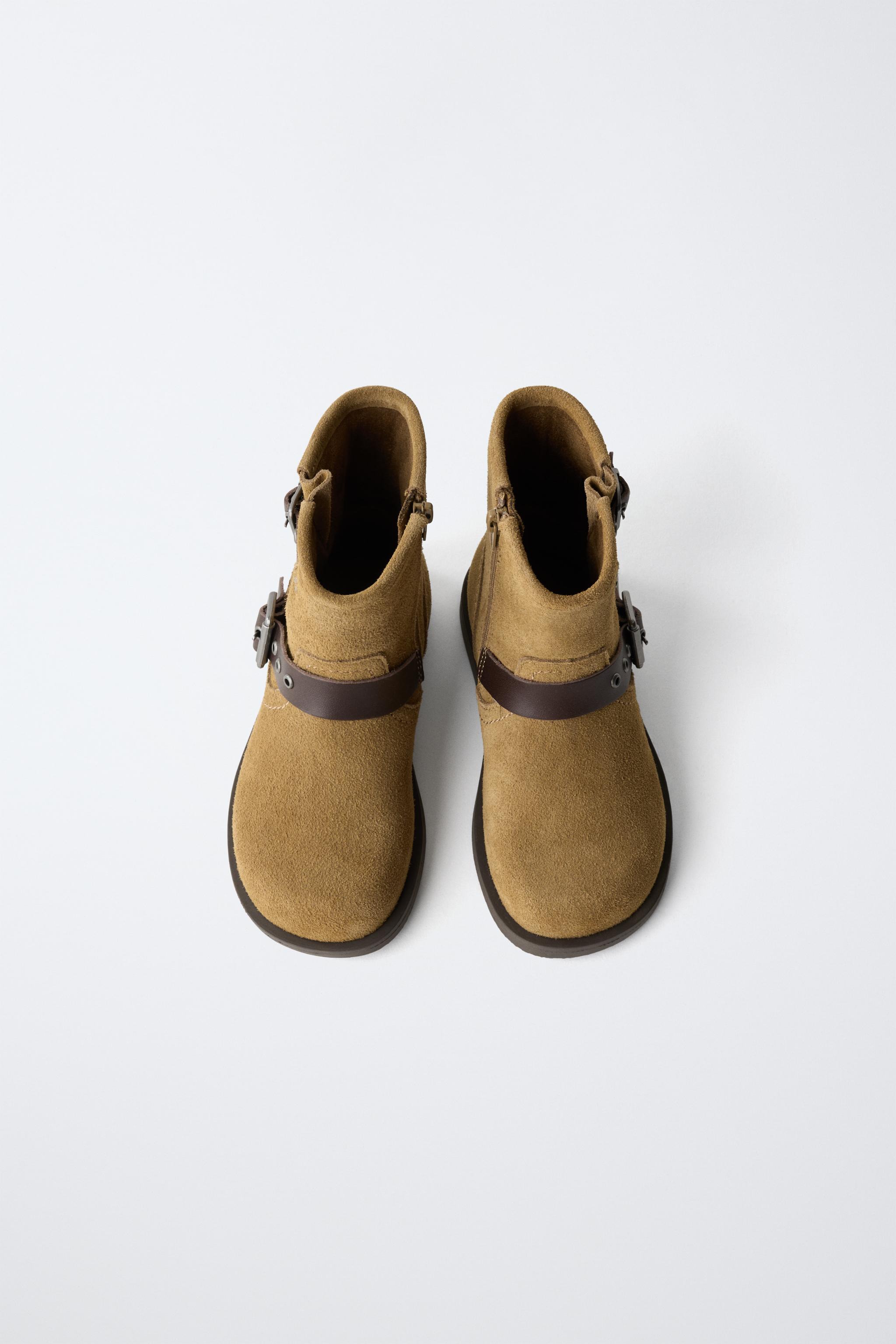 BOTTINES EN CUIR À DOUBLE BOUCLE