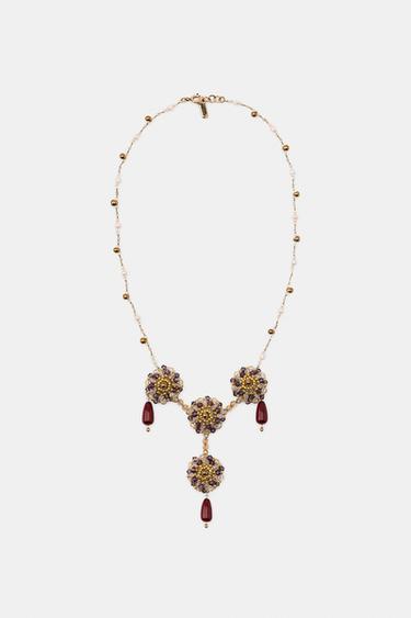COLLAR CHOKER ABALORIOS RESINA - Dorado de Zara