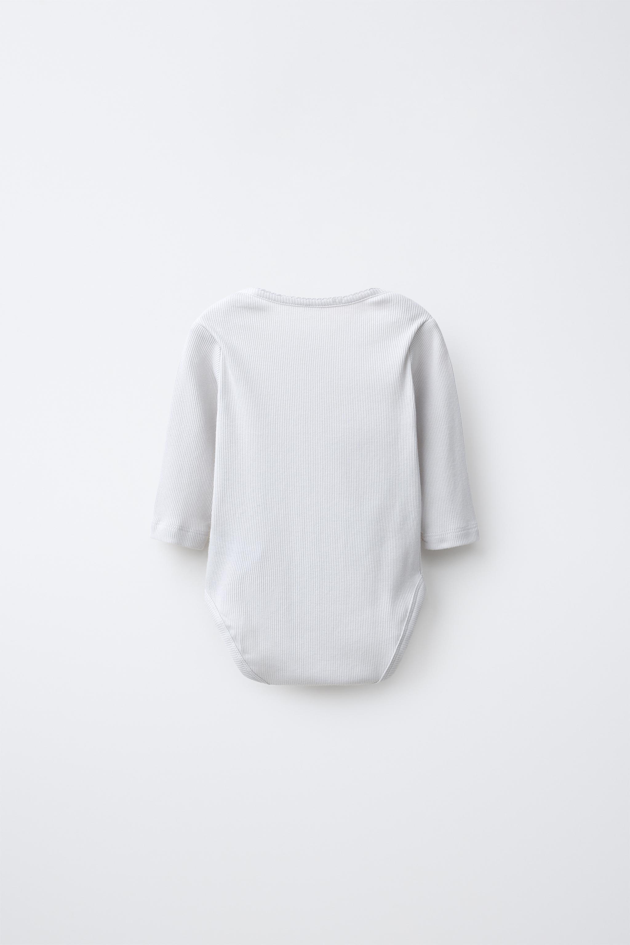 LOT DE CINQ BODYS MANCHES LONGUES IMPRIMÉ FLEURS