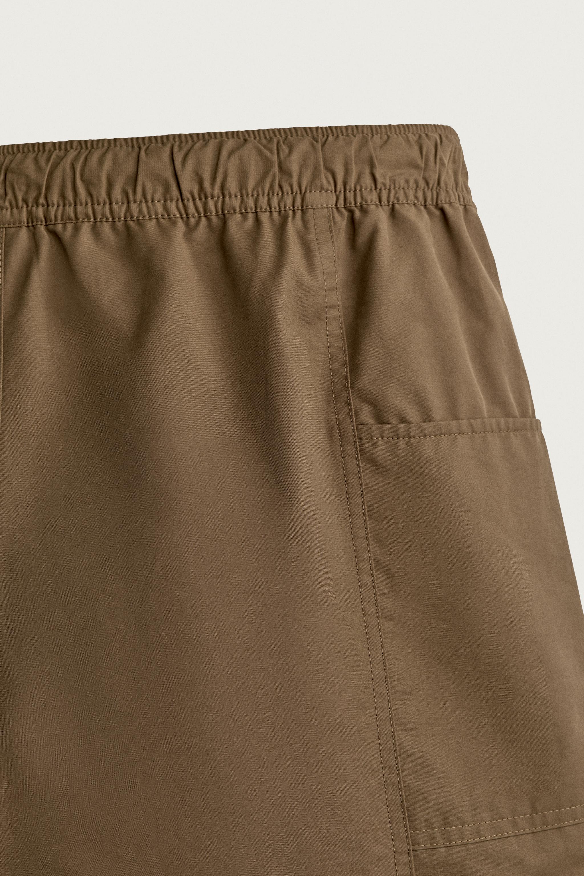 SEAMED SWIM SHORTS