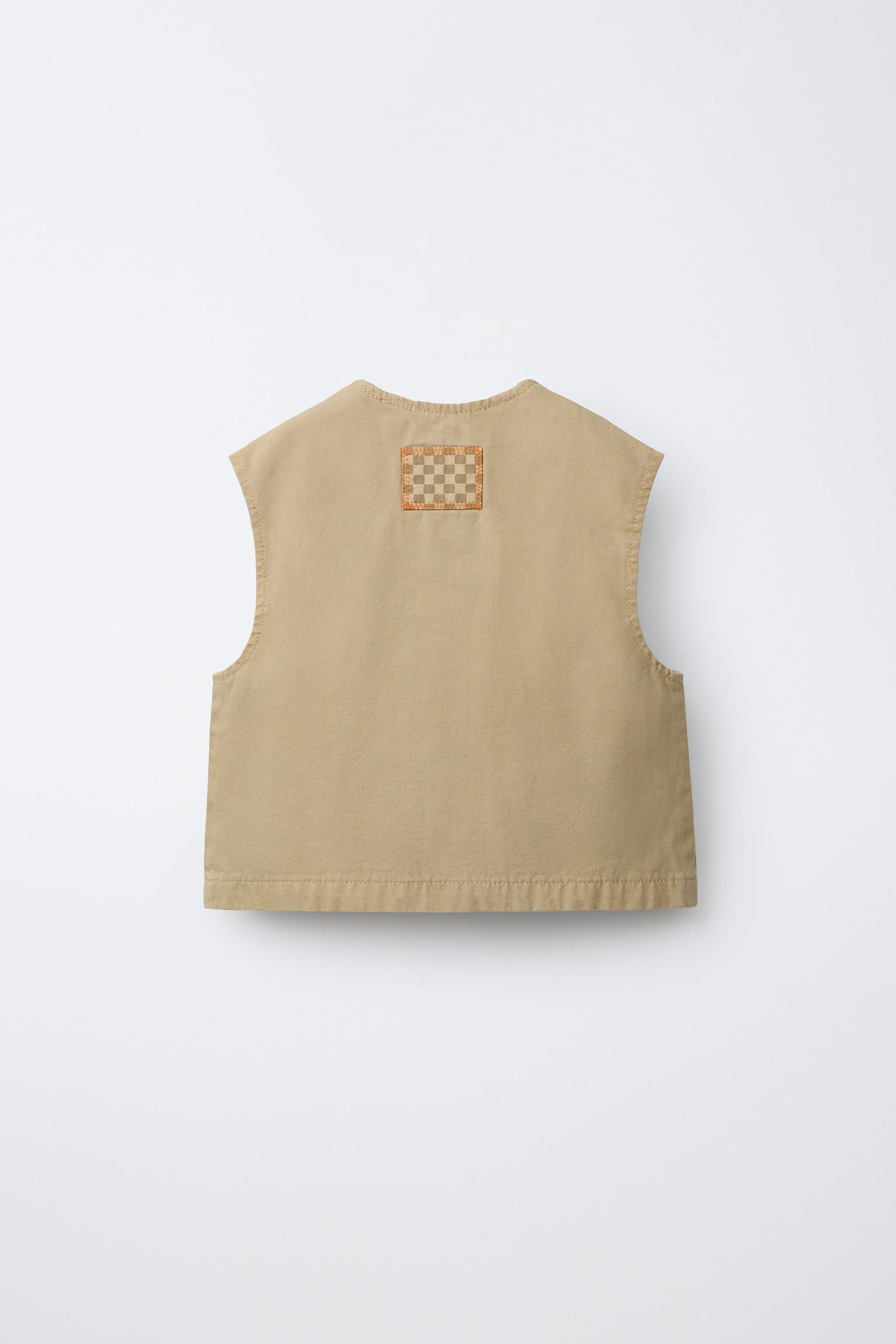 GILET SANS MANCHES PIÈCE