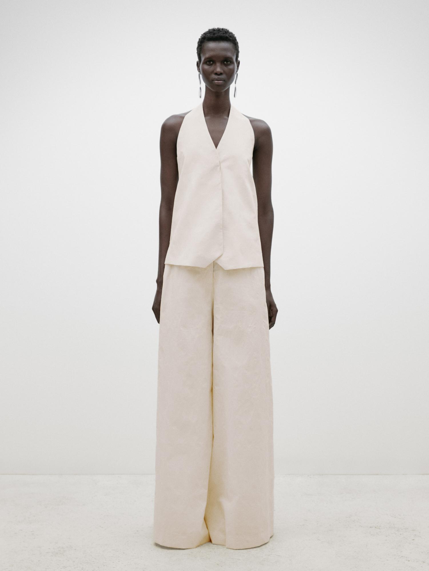 Creased-effect palazzo trousers - Limited Edition