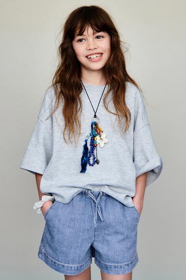 short fille en jeans bleu clair marque Zara, taille 8 ans, en très bon short fille en jeans bleu clair marque Zara, taille 8 ans, en très bon
