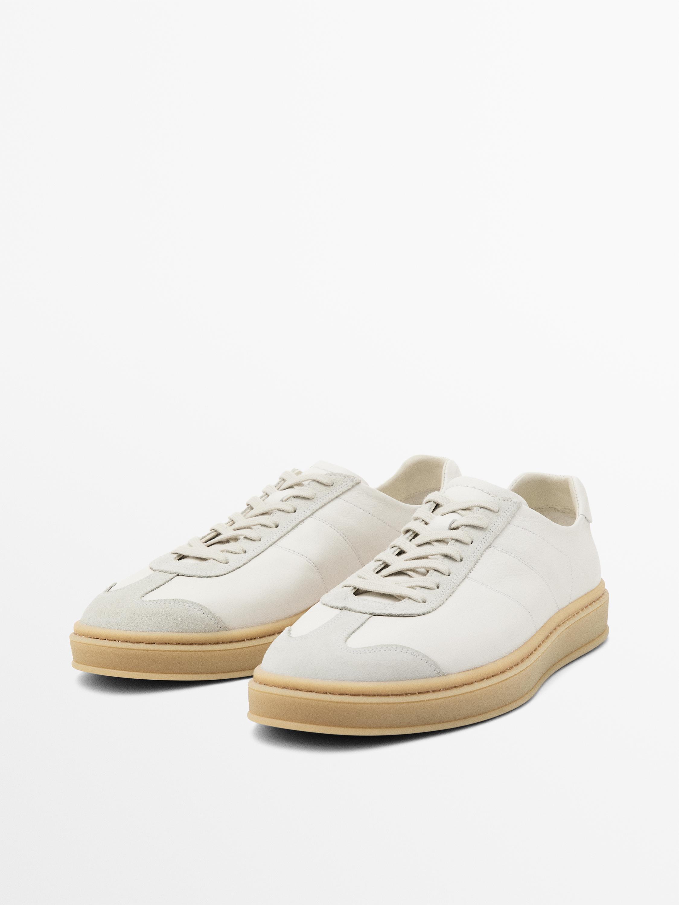 Tennis cuir contrastant